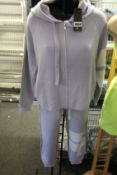 An as new Zoe Jordan Vida Lila track jacket and matching joggers (S/M).