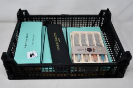 Three Fortnum and Mason knives for cheese, a Fortnum and Mason set of three cheese knives, a