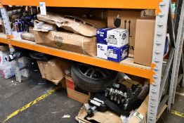 A large quantity of automotive parts and related items.