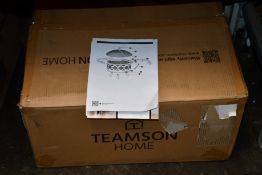 A Peaktop Outdoor 30 inch Round Steel Wood Burning Fire Pit.