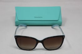 A pair of as new Tiffany & Co sunglasses.