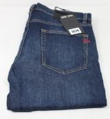 A pair of as new Diesel jeans (34