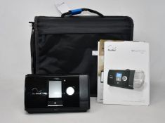 An as new ResMed AirSense Elite 10 CPAP machine.