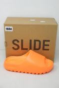 A pair of as new Adidas Yeezy Slide (UK 7).