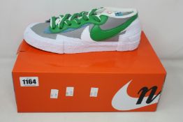 A pair of as new Nike Blazer Low/Sacai (UK 7).