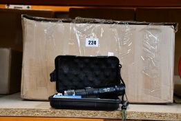 A box of Helius Zeta XO flashlights (Approximately 35 items).