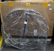 Twelve boxed as new assorted wall clocks.