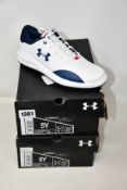 Two pairs of Under Armour Draw Sport SL Junior golf shoes (UK 4.5).