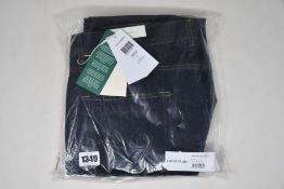 A pair of as new Lacoste jeans (W38/L32).