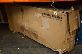 A pre-owned Zoomie GP500 Electric Scooter (This item is untested and may be incomplete, viewing is