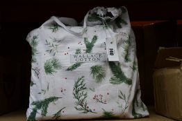 A Eucalyptus Double Duvet Set (200 x 200cm + 5cm Sham + 2 Pillowcases), a Purity Double Fitted Sheet