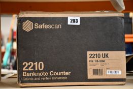 A boxed as new Safescan 2210 Banknote Counter.