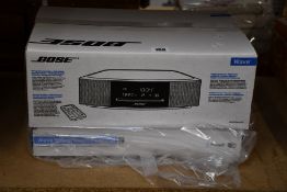 A boxed as new Bose Wave music system VI and an as new Bose Wave soundtouch pedestal.