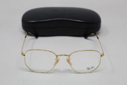 A pair of as new Ray Ban glasses frames.