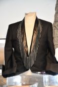 A pre-owned Saint Laurent jacket in black with tasselled neck/collar (Size unknown, very good
