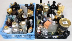 Two crates containing part used parfums/toilette to include Jean Paul Gaultier, Chanel, Calvin