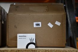 Twelve boxed as new Pandora Jewellery Care Kits.