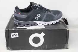 A pair of as new On Running Cloudflow trainers (UK 11.5).