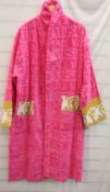 An as new Versace dressing gown in pink (L - Name Mixie on back in sequined letters).
