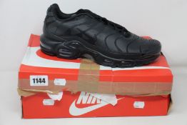 A pair of as new Nike Air Max Plus (UK 8.5).