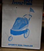 An InnoPet Deluxe sporty dog pram with bike trailer.