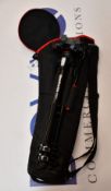 A pre-owned Manfrotto 190X Tripod with case.