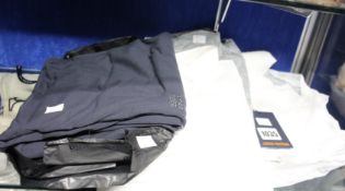 Two as new Louis Vuitton shirts with tags, two Hugo Boss shirts and an Eton shirt.