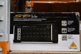 A Behringer SD16 Digital Snake Box (UK Adaptor may be required).