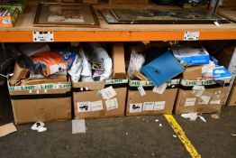 Four boxes of assorted miscellaneous items to include office chair back supports, garden solar