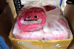 A quantity of novelty Baby Shark backpacks.