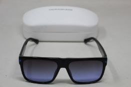 A pair of as new Calvin Klein sunglasses.