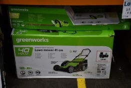 An as new Greenworks battery powered 41cm blade lawnmower and a Greenworks 24V hedge trimmer.