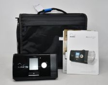 An as new ResMed AirSense Elite 10 CPAP machine.