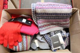 A quantity of as new Mackie woollen scarves, hats and gloves etc., (Approximately 25 items).