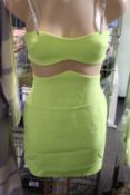 An as new David Koma linear mesh midriff mini dress in neon yellow (UK 14).