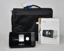 An as new ResMed AirSense Elite 10 CPAP machine.