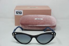 A pair of as new Miu Miu sunglasses.
