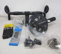 A lot containing mostly road bike components including Shimano Ultegra chainset, front and rear