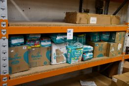 A large quantity of Pampers Baby Dry nappies in a variety of sizes (Approximately 30 items).