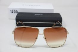 A pair of as new Givenchy sunglasses.