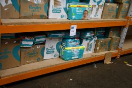 A large quantity of Pampers Baby Dry nappies in a variety of sizes (Approximately 30 items).
