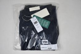 A pair of as new Lacoste jeans (W34/L32).