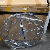 Twelve boxed as new assorted wall clocks.