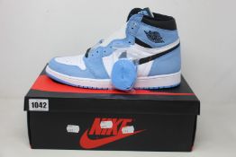 A pair of as new Nike Air Jordan 1 Retro High (UK 11).
