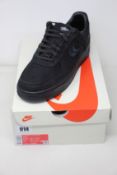 A pair of as new Nike Air Force 1 Low/Stussy (UK 9.5).