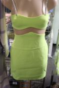 An as new David Koma linear mesh midriff mini dress in neon yellow (UK 12).