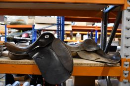 A pre-owned Ideal Wintec horse saddle and a pre-owned MG saddlery horse saddle.