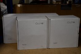 An Occhio sento parete doppio dimmable and tiltable wall lumiere with two heads.