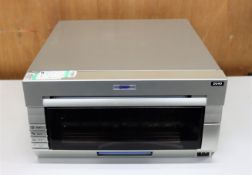COLLECTION ONLY: A pre-owned DNP DS40 photo printer (Some cosmetic damage).