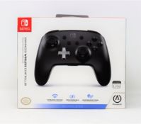 A boxed as new PowerA Enhanced Wireless Controller for Nintendo Switch in Black (Box sealed).